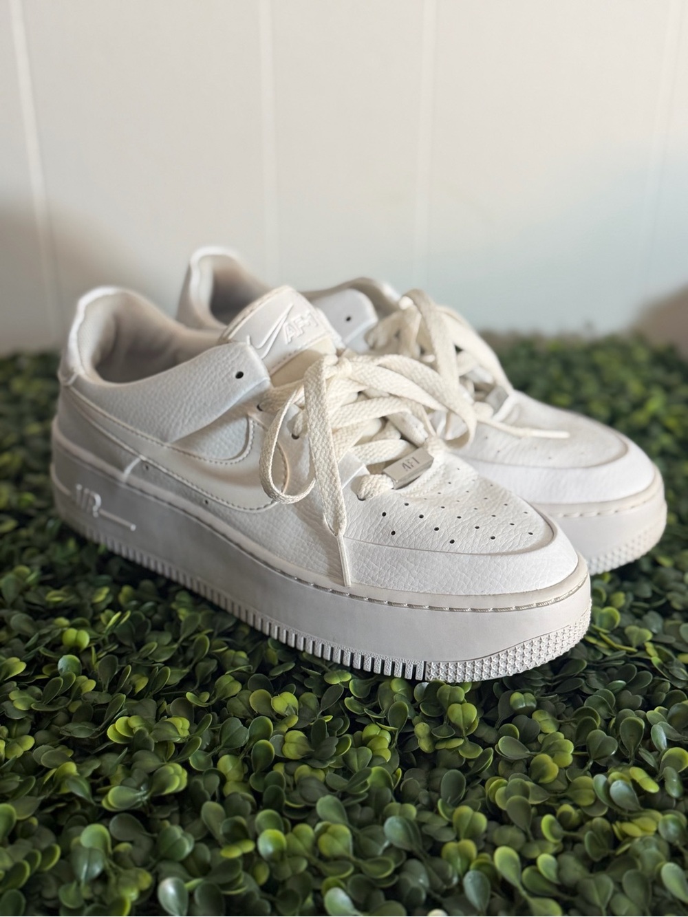 Nike Womenβs White Platform Leather Sneakers